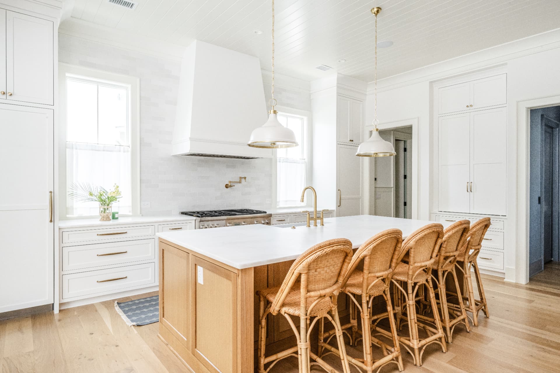 Custom ivory and navy kitchen cabinetry handcrafted by Sullivan Custom Cabinets